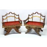 A PAIR OF 19TH/20TH CENTURY THAI CARVED HOWDAH ELEPHANT CHAIRS, profusely carved and pierced with