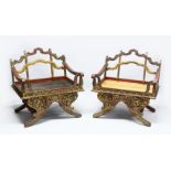 A SUPERB PAIR OF 19TH/20TH CENTURY THAI CARVED HOWDAH ELEPHANT CHAIRS, profusely carved and