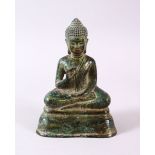 A CHINESE BRONZE FIGURE OF BUDDHA, in a seated position upon lotus, 11.5cm high