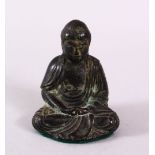 A CHINESE BRONZE FIGURE OF SEATED BUDDHA, seated with hands and legs crossed, the verso with a
