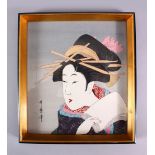 A JAPANESE WOODBLOCK PRINT OF A KABUKI ACTOR - KITAGAWA UTAMARO - depicting a posed kabuki actor