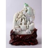 60A LARGER CHINESE CARVED JADEITE IMMORTAL & LANDSCAPE FIGURE, the stone carved with native