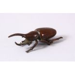 A JAPANESE BRONZE FIGURE OF A LONG HORN BEETLE - the base with a seal mark, 8cm