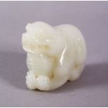 A WHITE JADE FIGURE OF A BEAST, 5cm long.