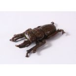 A JAPANESE BRONZE FIGURE OF A BEETLE, The underside with a seal mark, 6.5cm
