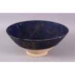 A 13TH CENTURY DEEP BLUE GALZED IRANIAN POTTERY BOWL, 19CM