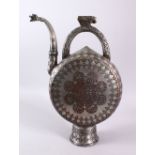 A LARGE PERSIAN TINNED COPPER SAFAVID EWER, the body carved with scrolling floral decoration and