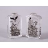 TWO CHINESE REVERSE PAINTED GLASS SNUFF BOTTLES, one depicting seated immortals and horses, with