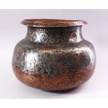 A 17TH CENTURY INDIAN TINNED COPPER LARGE CIRCULAR BOWL, with foliate engraved rim, the neck and