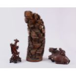 A LARGE CARVED AND PIERCED BAMBOO GROUP, 45cm high, a carved wood oxen, 19cm, and female figure on