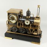 A GOOD STEAM ENGINE CLOCK with three dials, clock thermometer and barometer. 18ins high, 18ins wide