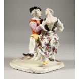 AN 18TH CENTURY FURSTENBERG PORCELAIN GROUP OF YOUNG LOVERS. 6ins high. One arm missing.