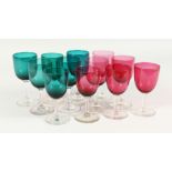 TWELVE VICTORIAN GLASSES, 6 cranberry and 6 green Victorian wines.