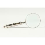 A MAGNIFYING GLASS WITH CHROME HANDLE