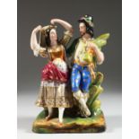 A SAMSON OF PARIS PORCELAIN GROUP OF A TURKISH MAN AND WOMAN DANCING 9ins high