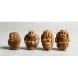 A SET OF FOUR CARVED BONE NETSUKE