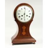 A MAHOGANY INLAID BALLOON CLOCK with blue and white dial and French movement. 13ins high.