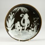 A GOOD PATE SUR PATE CIRCULAR DISH, with classical figures, palms, ferns and flowers 12ins diameter