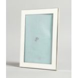 A PLAIN TIFFANY SILVER PHOTOGRAPH FRAME 7 x 5ins