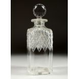 A CUT GLASS SQUARE WHISKEY DECANTER AND STOPPER