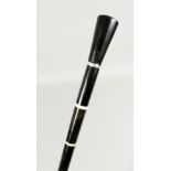 A VICTORIAN EBONY AND IVORY CANE 35ins long.