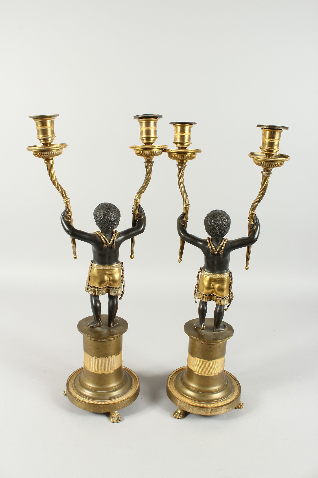 A SUPERB PAIR OF EMPIRE BRONZE AND GILT BRONZE TWO BRANCH CANDLESTICKS of nubian children holding - Image 7 of 9