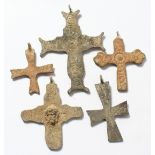 FIVE MEDIUM ROMAN IRON CROSSES.