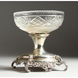A VICTORIAN CUT GLASS COMPORT with silver base. London1899
