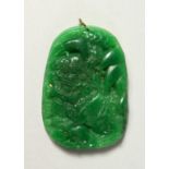 A CARVED CHINESE JADE PENDANT