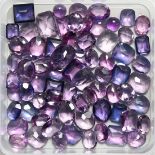 A BOX OF KUNZITE AND AMETHYST STONES