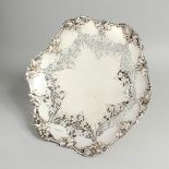 A GOOD SILVER CIRCULAR PIERCED TAZZA, decorated with fruiting vines, 11 ins diameter. Sheffield