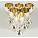 A SET OF SIX SILVER GOBLETS, 6 ins high with crest, Crown XCIV. London Weighs 28oz