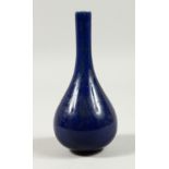 A CHINESE BLUE LONG NECK VASE.