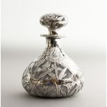 A GOOD SILVER OVERLAY SCENT BOTTLE AND STOPPER.
