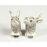 A PAIR OF .925 SILVER PLATE RABBIT'S HEAD SALT AND PEPPERS