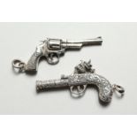 TWO CAST SILVER NOVELTY PISTOLS