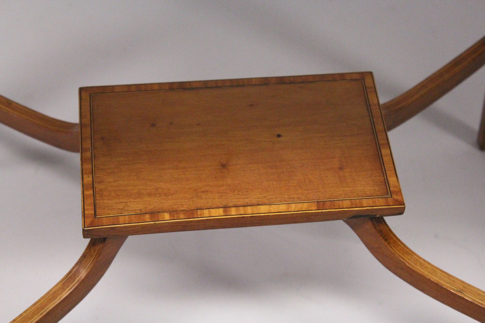 AN EDWARDIAN MAHOGANY FOLDING TOP TEA TABLE, on tapering legs with under tier. 1ft 9ins long. - Image 3 of 5