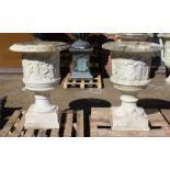 A SUPERB NEAR PAIR OF ITALIAN CARVED WHITE MARBLE URNS ON STANDS, the sides covered with dancing