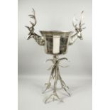 A LARGE STAG'S HEAD WINE COOLER ON STAND 41ins high.