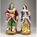 A LARGE PAIR OF PARIS PORCELAIN FIGURES OF A TURKISH MAN holding a sword and a young lady. 16ins