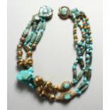 A ROMAN TURQUOISE AND SILVER GILT NECKLACE