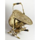 A VERY GOOD VICTORIAN BRASS COAL PURDONIUM on a folding stand with shovel.