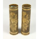 TRENCH ART, A GOOD PAIR OF BRASS SHELL CASES engraved with flowers. 11.5ins hgih