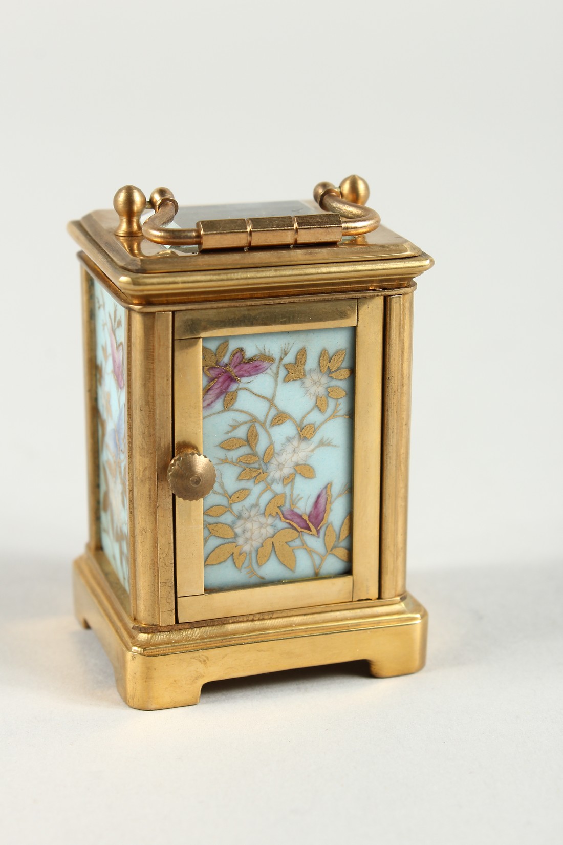 A MINIATURE SEVRES CARRIAGE CLOCK with flora porcelain panels. 2.25ins high. - Image 3 of 7