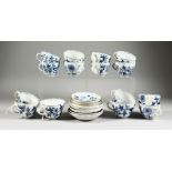 A QUANTITY OF MEISSEN BLUE AND WHITE ONION PATTERN CUPS AND SAUCERS, fifteen various cups and