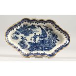 A CAUGHLEY BLUE AND WHITE SHAPED OVAL WILLOW PATTERN SPOON TRAY. Crescent mark in blue. 6ins long.