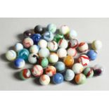 A COLLECTION OF FORTY VARIOUS COLOURED MARBLES 1-1.5cm.