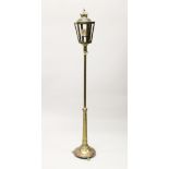 A BRASS LANTERN LAMP 6ft high