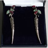 A PAIR OF SLVER, EMERALD, RUBY AND SAPPHIRE FEATHER DESIGN EAR RINGS