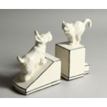 A PAIR OF ART DECO DESIGN CAT AND DOG BOOK ENDS 6ins high